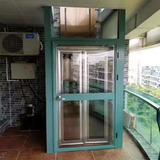 Hydraulic home elevator with manual swing doors